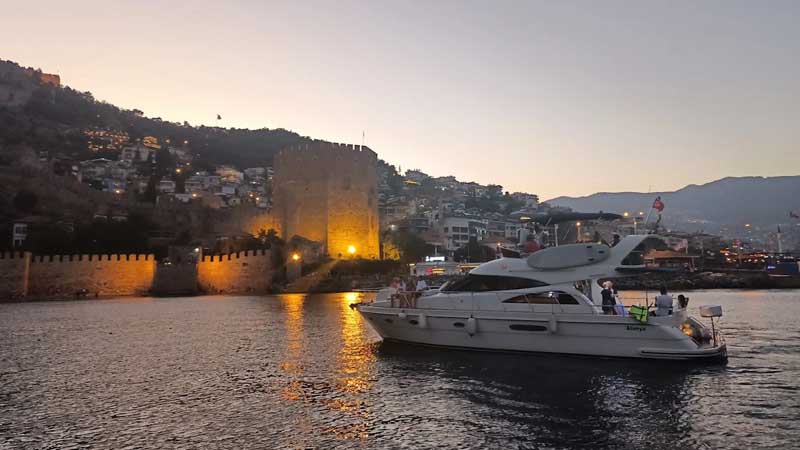 private yacht on sunset in konakli